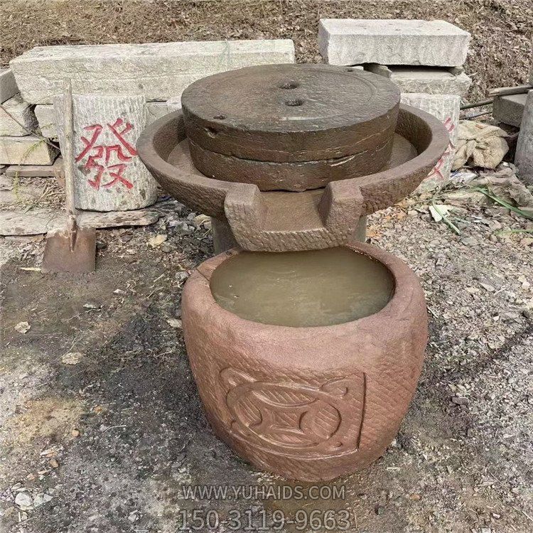 石雕磨盤，磨豆子的傳統(tǒng)設(shè)備雕塑