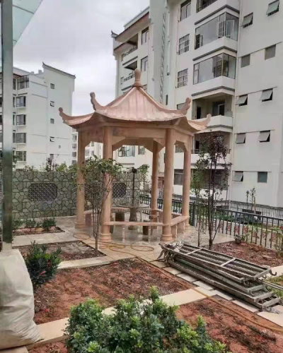 小區(qū)園林石涼亭，晚霞紅大理石石雕亭子
